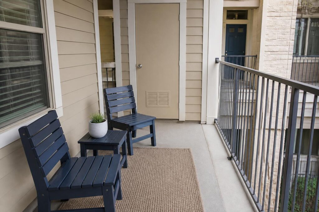 Condo balcony with simple outdoor seating