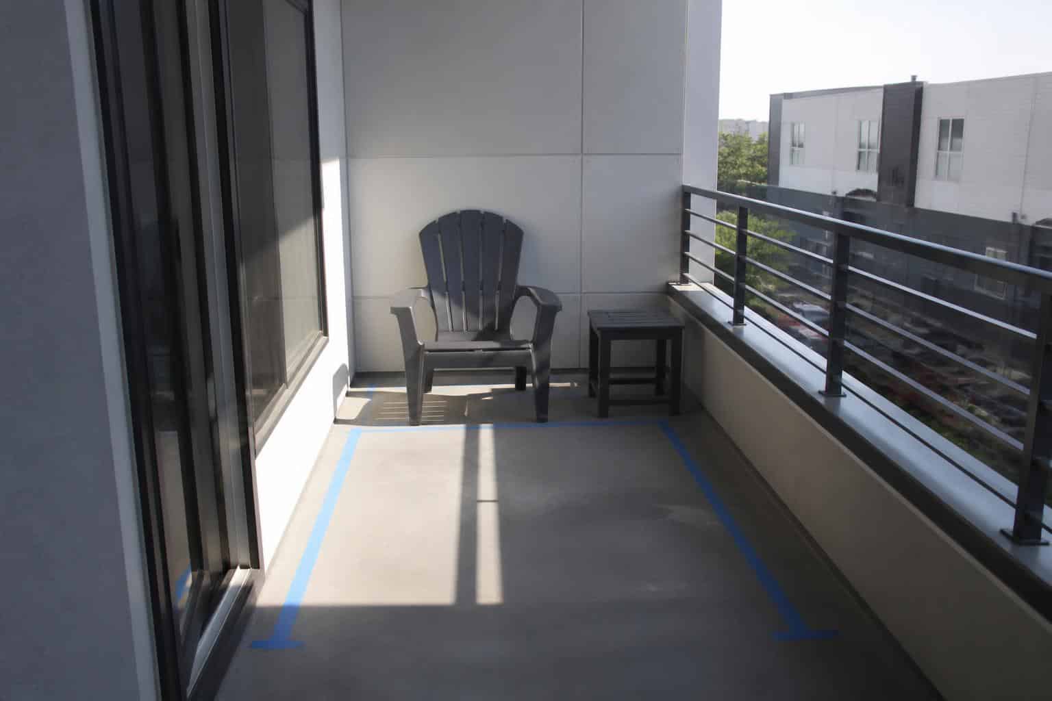 Measured balcony layout with chair and table