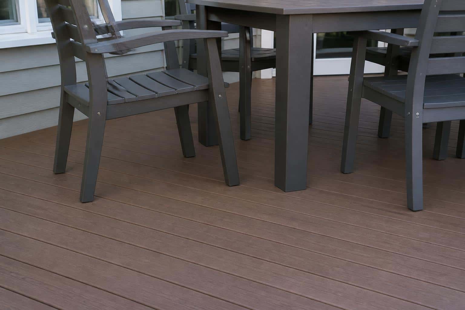 Chair feet resting on a clean composite deck
