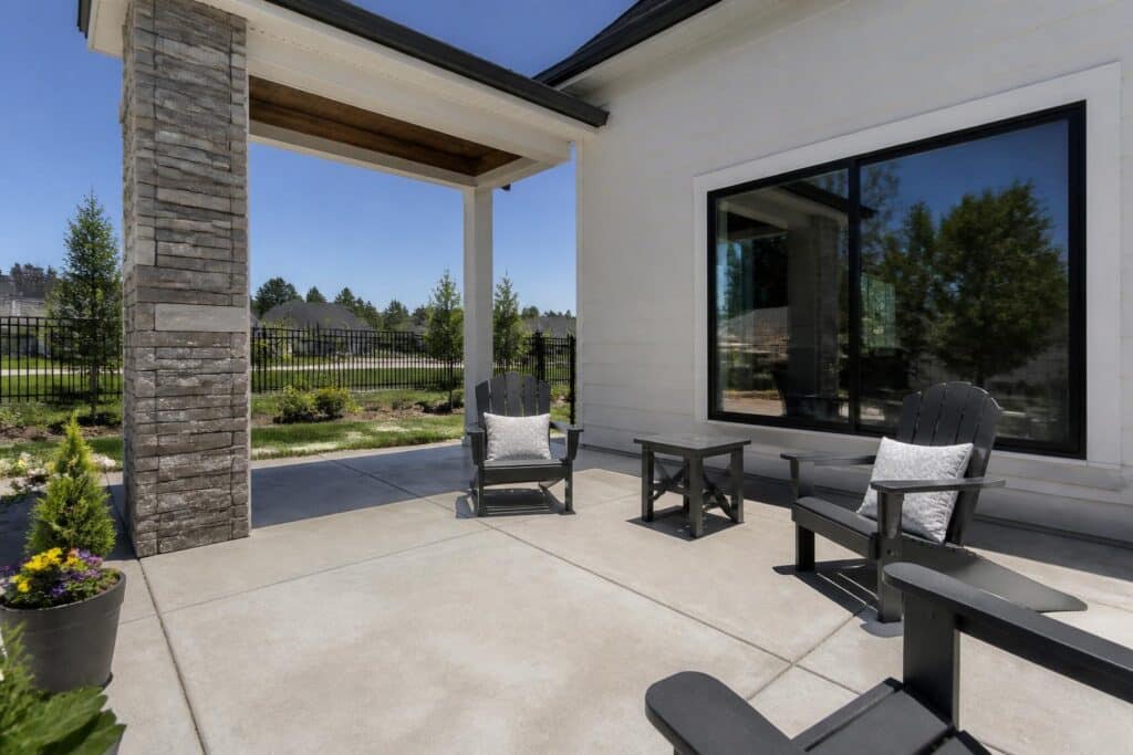 Outdoor furniture on a clean concrete patio