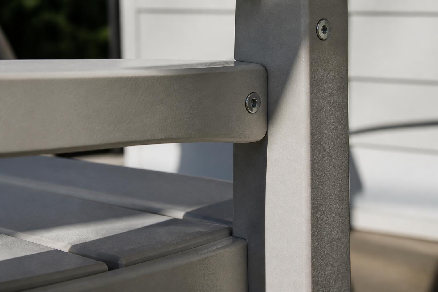Stainless steel fasteners at a Marine Grade Polymer chair joint