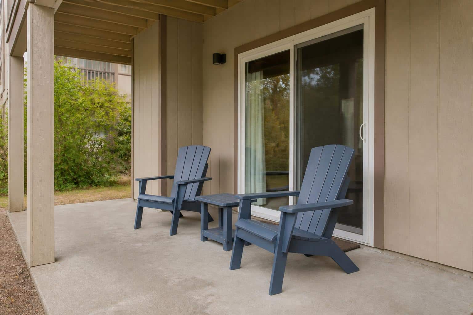 Backyard patio seating arranged for guest turnover