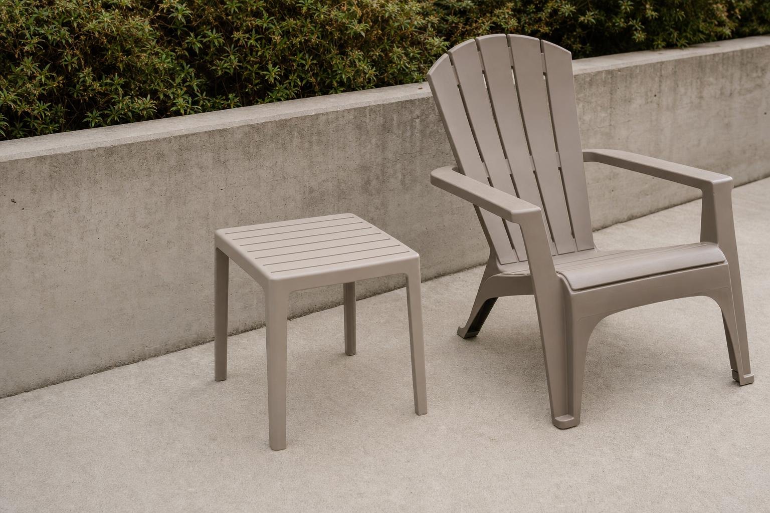 Open outdoor side table beside a patio chair with clear legroom